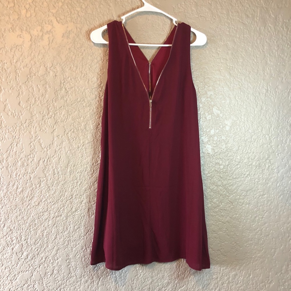 Flowy red dress with adjustable zippers